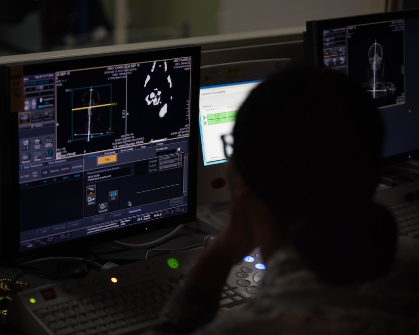 U.S. Air Force Senior Airman Jaclyn Johnson, 633rd Surgical Operations Squadron radiology tech, evaluates a practice image taken during radiology trauma training on Joint Base Langley-Eustis, Virginia, Sept. 26, 2019. Members of the 633rd SGCS practiced transporting patients, taking X-rays and evaluating medical injuries during their training. (U.S. Air Force photo by Airman 1st Class Marcus M. Bullock)