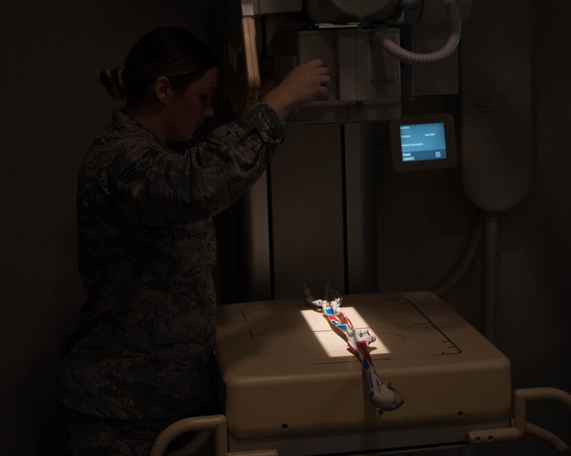 U.S. Air Force Senior Airman Abby Berg, 633rd Surgical Operations Squadron radiology tech, prepares to take an X-ray during radiology trauma training on Joint Base Langley-Eustis, Virginia, Sept. 26, 2019. Members of the 633rd SGCS use equipment such as this to help them properly assess patients’ injuries they may encounter during real world scenarios. (U.S. Air Force photo by Airman 1st Class Marcus M. Bullock)