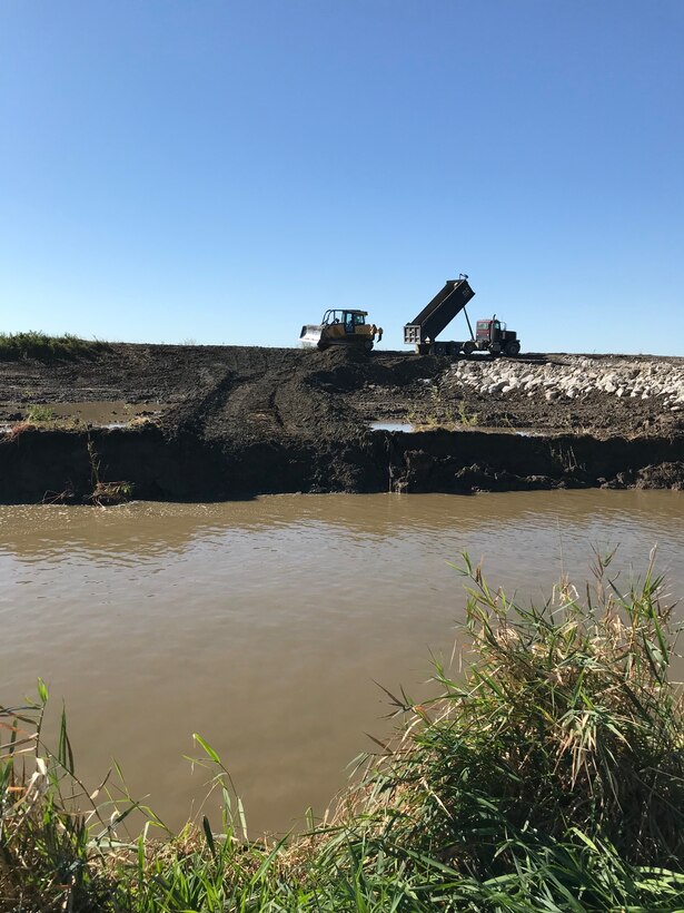 Ongoing construction to repair the L-594 breach location approximately 0.5 miles south of Bartlett, Iowa. Photo taken on Sep. 23, 2019.