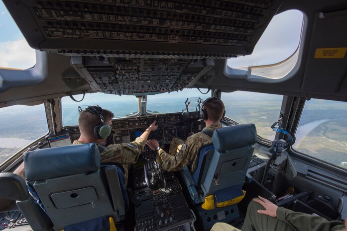 U.S. Air Force Capt. Matthew Spretnjak and U.S. Air Force Maj. Clark Belfanti, both C-17 Globemaster III pilots assigned to the 14th Airlift Squadron, perform low-level flying operations during a local training mission Sept. 26, 2019, over South Carolina. Training missions allow aircrew to maintain currency, training and evaluations in all flying requirements. These training capabilities allow 14th AS Aircrew members to enhance rapid global mobility anytime, anywhere.