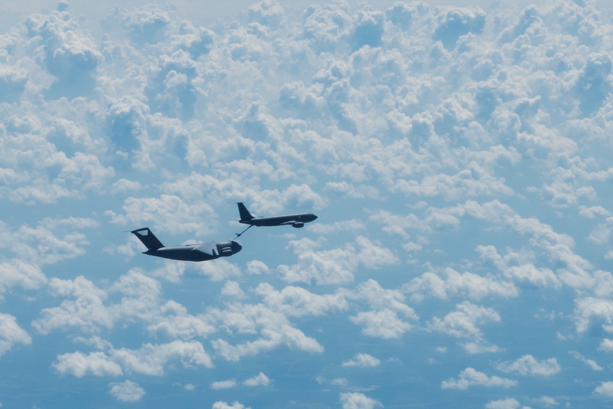 A C-17 Globemaster III, from Joint Base Charleston, S.C., receives fuel from a KC-135R Stratotanker, from MacDill Air Force Base, Fl., during a local training mission Sept. 26, 2019, over South Carolina. Training missions allow aircrew to maintain currency, training and evaluations in all flying requirements. These training capabilities allow 14th Airlift Squadron Aircrew members to enhance rapid global mobility anytime, anywhere.