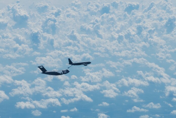 A C-17 Globemaster III, from Joint Base Charleston, S.C., receives fuel from a KC-135R Stratotanker, from MacDill Air Force Base, Fl., during a local training mission Sept. 26, 2019, over South Carolina. Training missions allow aircrew to maintain currency, training and evaluations in all flying requirements. These training capabilities allow 14th Airlift Squadron Aircrew members to enhance rapid global mobility anytime, anywhere.