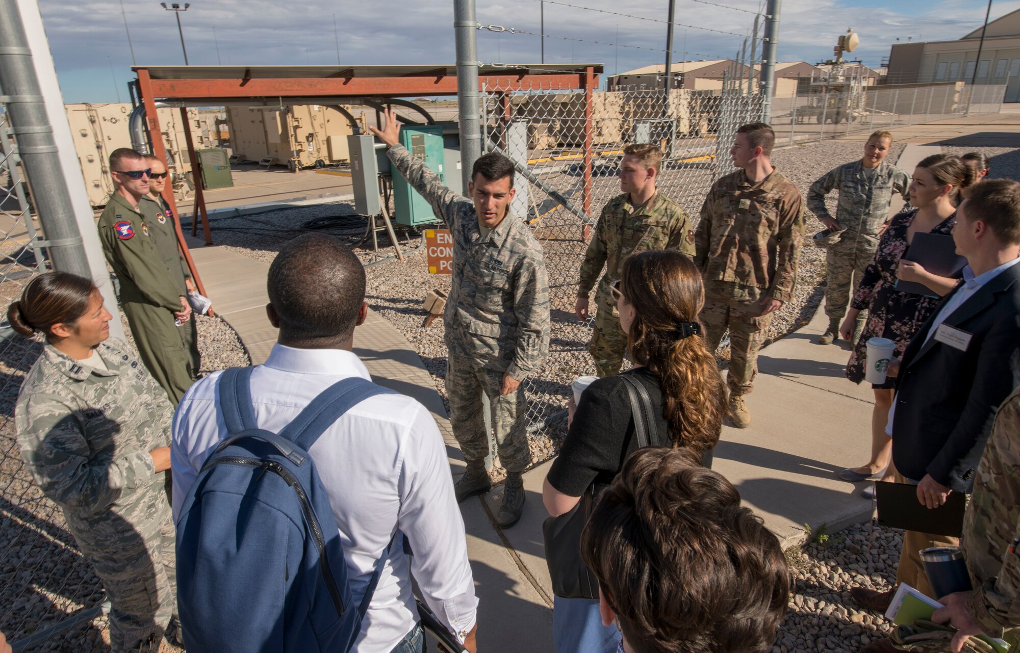 1st Lt. Alex Gharakanian, 49th Aircraft Maintenance Squadron aircraft communications maintenance unit officer-in-charge, introduces the MQ-9  Cockpit Farm to Congressional staffers, Oct. 2, 2019, on Holloman Air Force Base, N.M. The staffers represent Congresswoman Deb Haaland, Congresswoman Xochitl Torres Small, Congresswoman Veronica Escobar and Senator Martin Heinrich. (U.S. Air Force photo by Staff Sgt. Christine Groening)