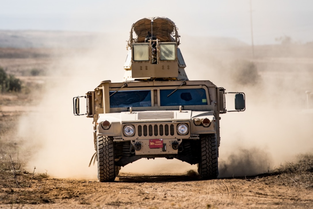 U.S. Marines with 1st Battalion, 5th Marine Regiment, 1st Marine Division, drive a M1114 Humvee during the Marine Corps Combat Readiness Evaluation (MCCRE) on Marine Corps Base Camp Pendleton, California, Sept. 21, 2019. 5th Marines conducted a regimental-sized MCCRE for 1st Battalion, 5th Marines and 2nd Battalion, 5th Marines, as well as the Regimental Headquarters to increase the combat proficiency and readiness of the regiment. The MCCRE took place over a 10 day period and served as proof of concept for future regimental-sized MCCREs. (U.S. Marine Corps photo by Lance Cpl. Alexa M. Hernandez)