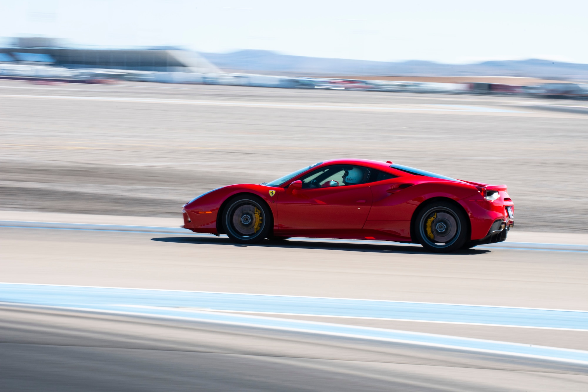 A Ferrari races on a track in Las Vegas