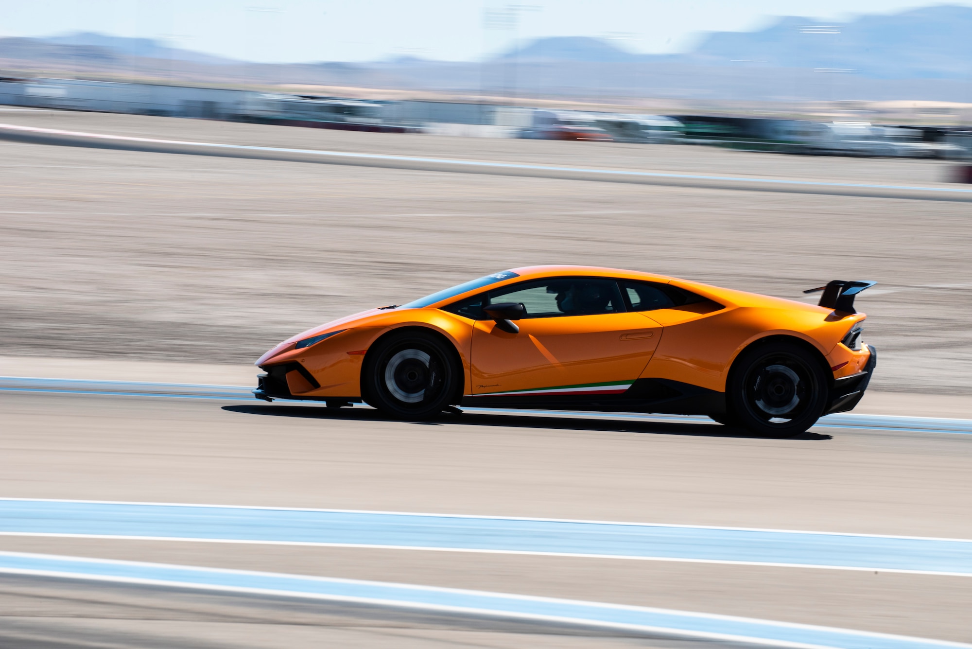 A Lamborghini racing on a track in Las Vegas