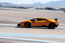 U.S. Air Force Tech. Sgt. Rashodrick Jackson, a transmissions systems section chief assigned to the 99th Communications Squadron (CS), takes hot laps in a Lamborghini Huracan Performante at Exotics Racing in Las Vegas, April 3, 2019. The experience was part of the new 99th CS Adventurous Training Program for high performing service members. (U.S. Air Force photo by Staff Sgt. Joshua Kleinholz)