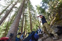 U.S. Air Force Master Sgt. Aimee Klarmann, a first sergeant assigned to the 99th Communications Squadron, stops for a hydration break during a backpacking trip across the Continental Divide in Rocky Mountain National Park, Colorado, July 18, 2019. The trip covered 3,500 feet of elevation change. (U.S. Air Force photo by Staff Sgt. Joshua Kleinholz)