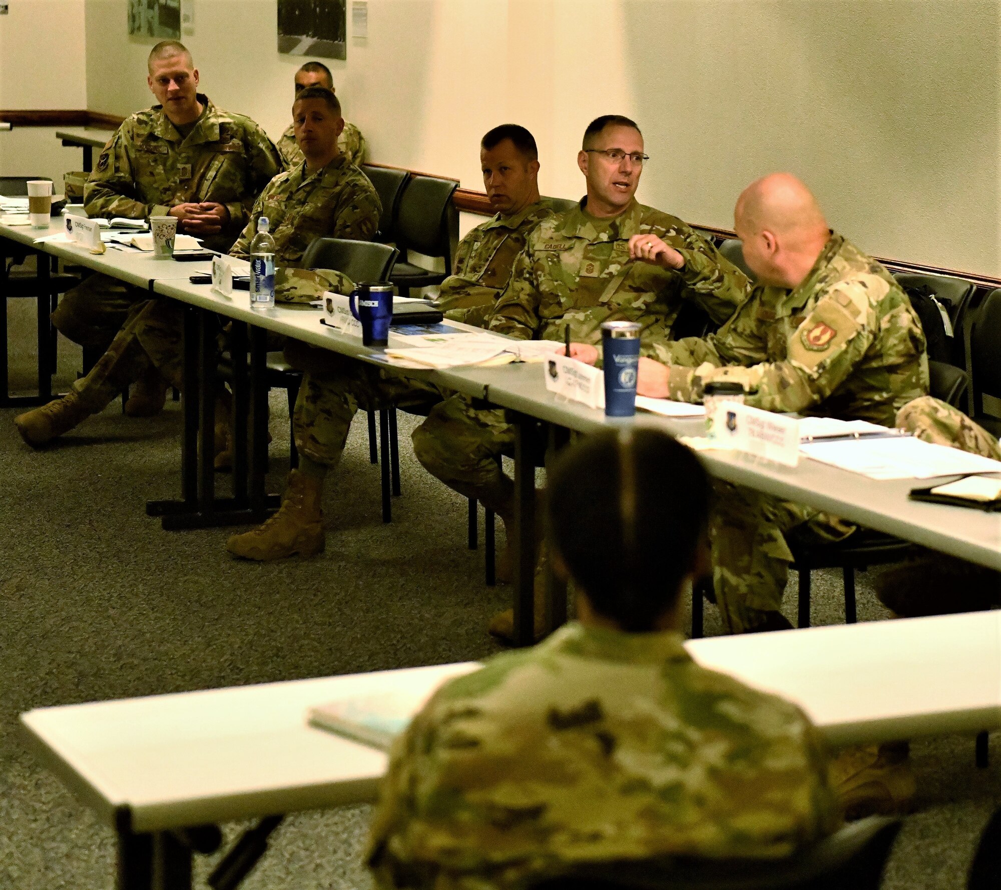 Chief Master Sgt. Stanley Cadell (second from right) provides a headquarters perspective on an Airman issue during the inaugural AFMC Command Chief Orientation, Oct. 1, at Wright-Patterson Air Force Base, Ohio. The two day event, was designed to familiarize new AFMC wing and center command chiefs with the overall organizational mission and how their units fit into the bigger picture. (Air Force Photo by Darrius Parker/released)