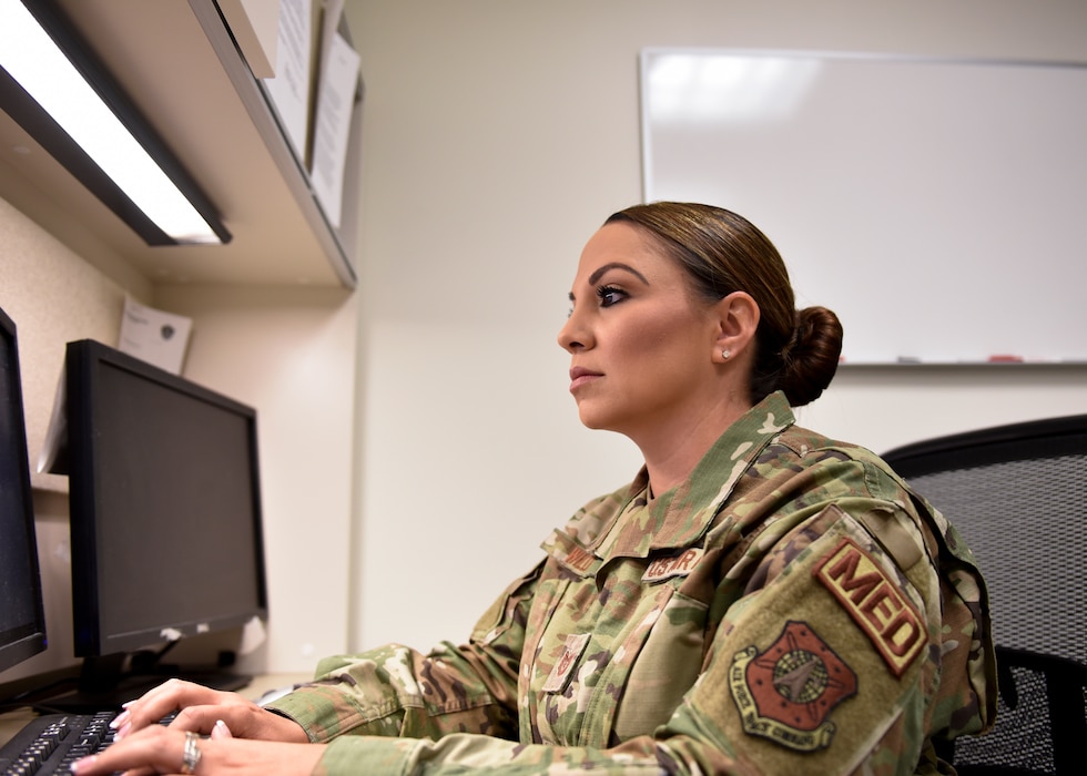 Tech. Sgt. Jerrica Wild, 21st Operational Medical Readiness Squadron independent duty medical technician, works at her desk finishing notes from the morning at the clinic on Peterson Air Force Base, Colorado September 25, 2019. Wild provides care to active duty service members at Peterson and Cheyenne Mountain Air Force Station. As an independent duty medical technician, she is qualified to see active duty members for acute issues as a provider. (U.S. Air Force photo by Airman Alexis Christian)