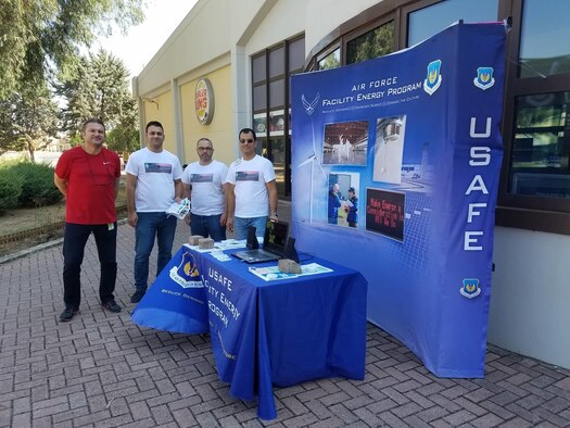 Members of the 39th Civil Engineer Squadron Base Energy Management team pose at a booth outside the Base Exchange Oct. 5, 2018, at Incirlik Air Base, Turkey, to kick off Energy Action Month. October is designated as the month to educate Air Force members on the importance of reducing energy and water use. (Courtesy photo)