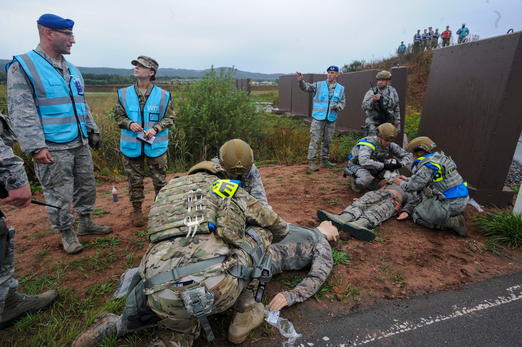 U.S. Airmen assigned to the 86th Security Forces Squadron perform self aid and buddy care procedures during an Operation Varsity 19-03 scenario at Ramstein Air Base, Germany, Sept. 24, 2019. Operation Varsity 19-03 was a weeklong exercise designed to test the capabilities of Ramstein Airmen. (U.S. Air Force photo by Tech. Sgt. Timothy Moore)