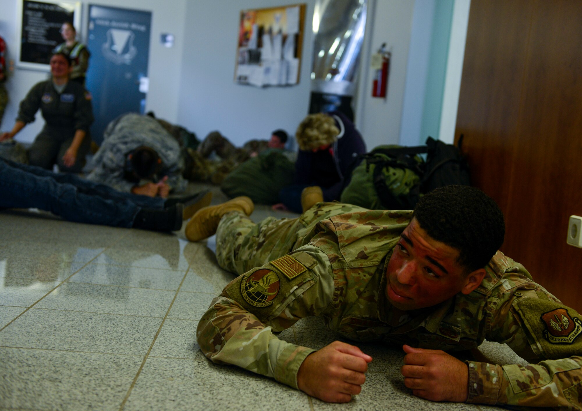 U.S. Airmen and German civilians participating in a simulated mass casualty event for Operation Varsity 19-03 act out their injuries at Ramstein Air Base, Germany, Sept. 25, 2019. The actors added another level of realism to the event that first responders could not experience during an exercise without them. (U.S. Air Force photo by Tech. Sgt. Timothy Moore)