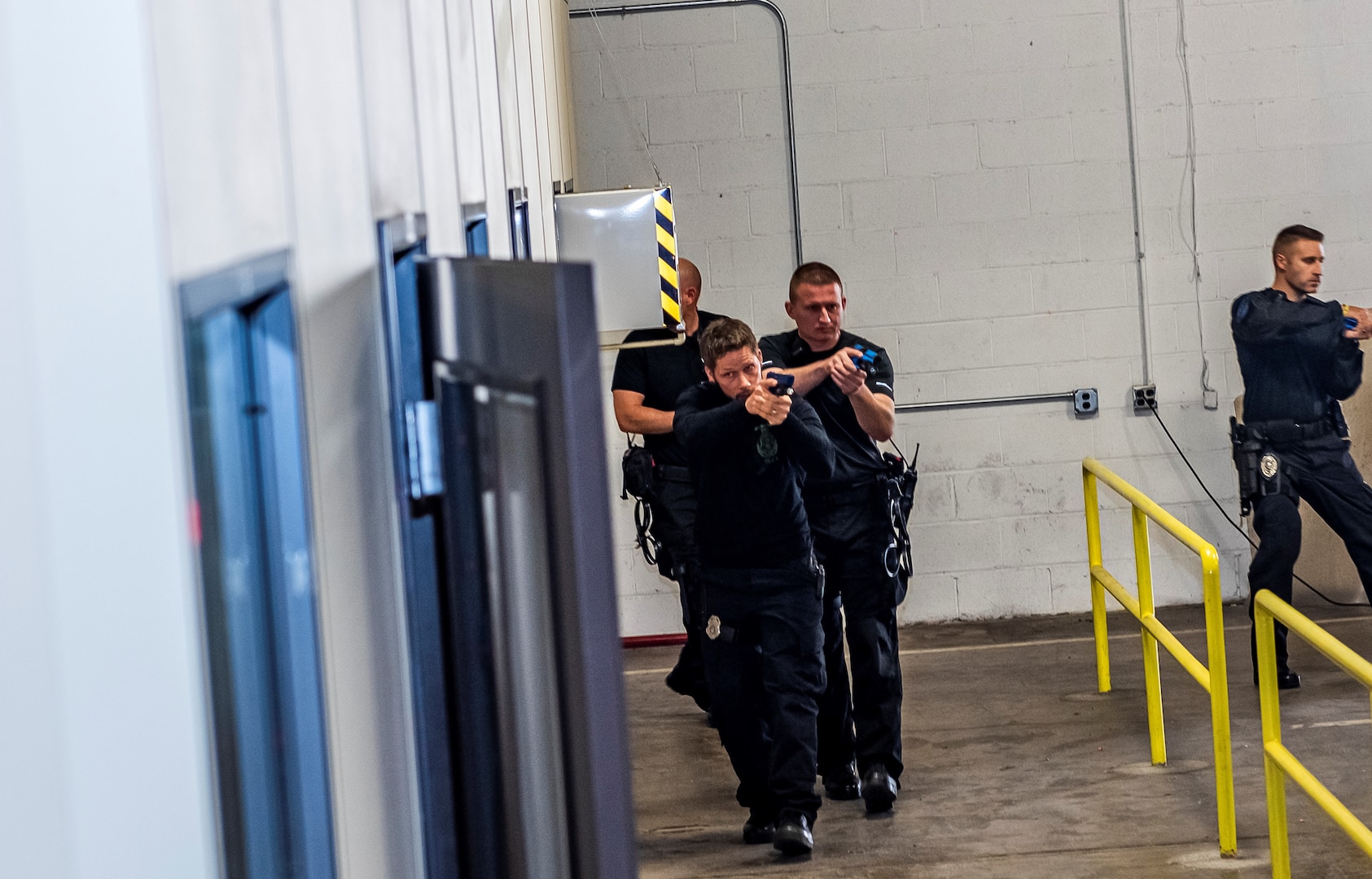 Law enforcement officers conduct operation exercise.