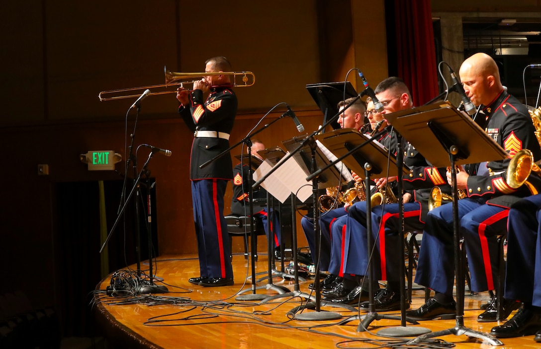 U.S. Marine Corps Gunnery Sgt. Ken Ebo, a musician technical assistant for the 8th Marine Corps District, performs a Trombone solo alongside Marine Musicians with the Marine Corps Jazz Orchestra during a concert at Texas Christian University in Fort Worth, Texas, Sept. 23, 2019. The performance was conducted to highlight the talents of Marine Musicians and inspire others to join their ranks.