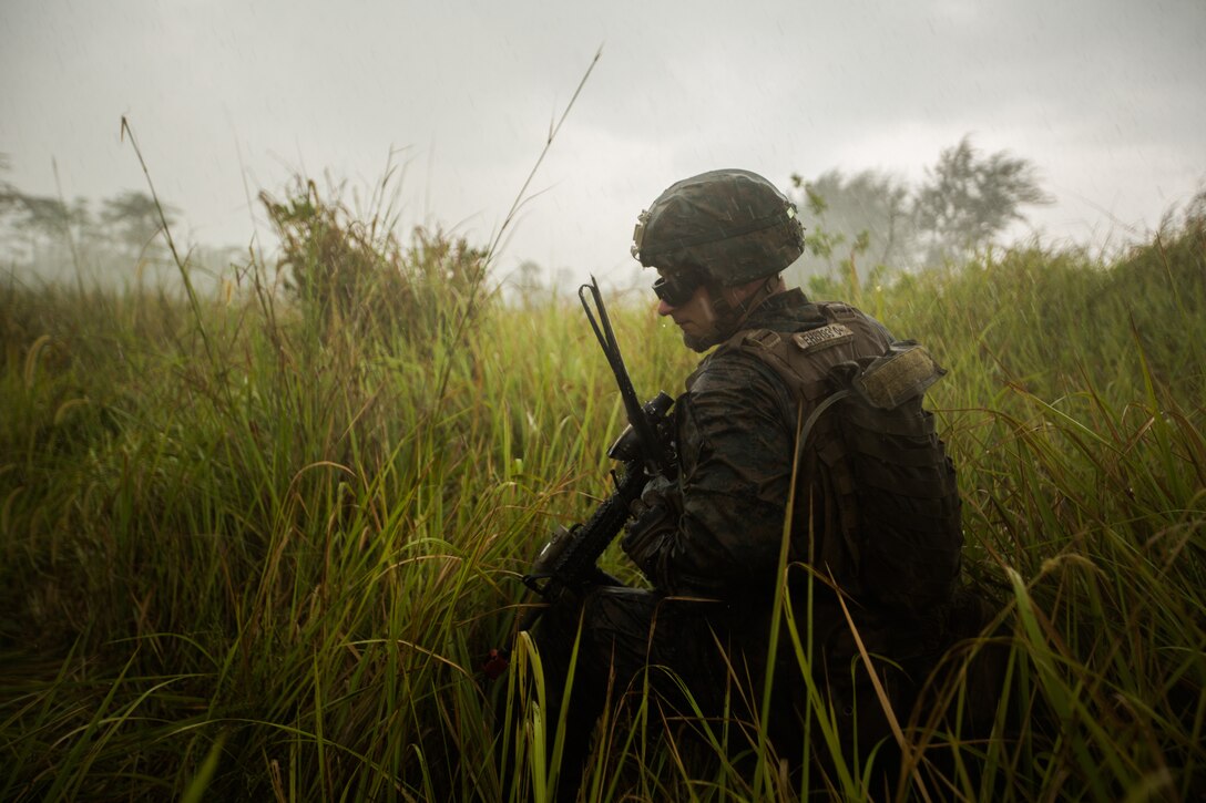 A U.S. Marine conducts an amphibious assault with members of the Malaysian Armed Forces during exercise Tiger Strike 2019 at Blue Beach, Malaysia, Oct. 2.