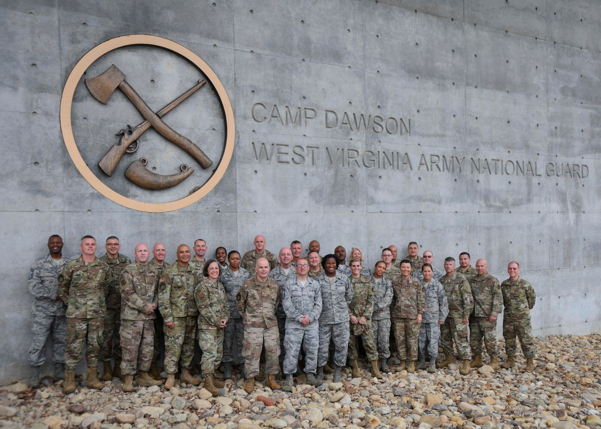 Approximately 30 U.S. Air force chief caster sergeants, assigned to the Air National Guard Readiness Center, pose for a group photo at Camp Dawson, West Virginia, Sept. 15, 2019. The chiefs traveled to Camp Dawson to participate in a two-day, teambuilding off-site event titled “Back to the Basics.” (U.S. Air National Guard photo by Staff Sgt. Morgan R. Lipinski)
