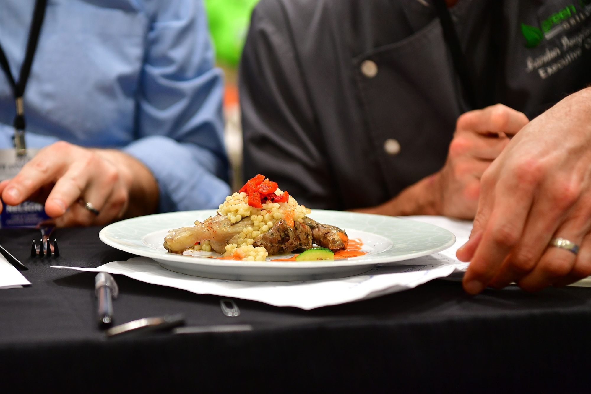 Judges prepare to taste test the contestant’s dishes.