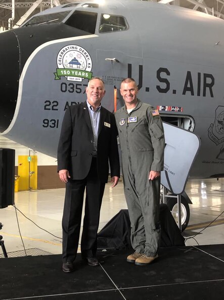 Randy White, Mayor of Derby and 931st Operations Group honorary commander, and Col. Phil Heseltine, 931st Air Refueling Wing commander pose in front of the KC-135 Stratotanker nose art dedicated to the city of Derby’s 150th anniversary Oct. 2, 2019, at McConnell Air Force Base, Kan. The event promoted partnership between the local community and military members, while also honoring their long history together.