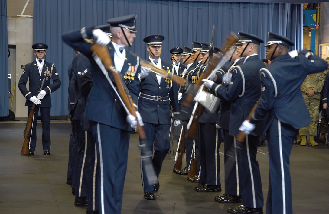 Members of the U. S. Air Force Honor Guard Firing Party conduct a drill requiring utmost precision during an immersion tour for Air Force District of Washington leadership Oct. 1.