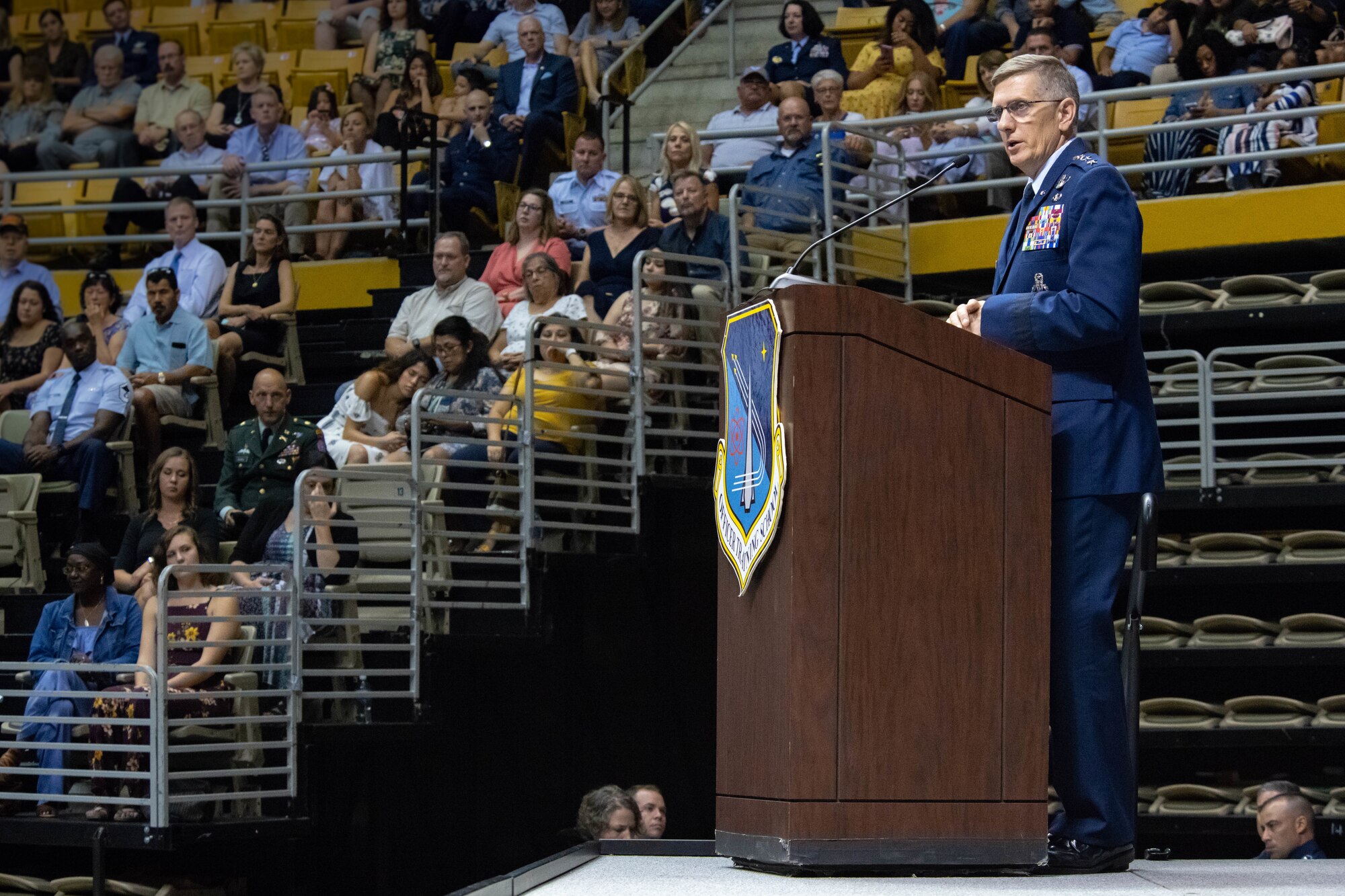Gen. Tim Ray, Air Force Global Strike Command commander, presents awards to newly commissioned officers from Air University’s Officer Training School “Godzilla” class 19-07 during a ceremony at the Alabama State University Acadome, Montgomery, Ala., Sept. 26, 2019. The recipients earned these distinctions through their actions and dedication throughout the eight weeks of training.