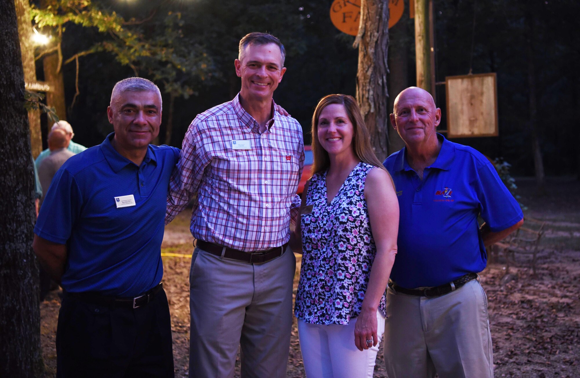 (From left to right) Chief Master Sgt. Raul Villarreal, 14th Flying Training Wing command chief, Maj. Gen. Wills, 19th Air Force commander, Col. Samantha Weeks, 14th Flying Training Wing commander, and Chuck Bigelow, Base Community Council president, attend a base/community event Oct. 1, 2019, in Columbus, Miss. During Wills’ visit he attended an event at Grahams Camp to see the engagement between leaders of Columbus Air Force Base and the members of the community. (U.S. Air Force photo by Airman 1st Class Jake Jacobsen)
