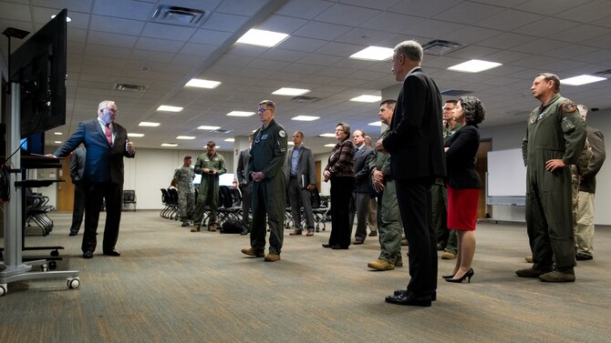 Air Force Global Strike Command partners at the Institute of Defense Analysis give command leadership a demonstration of a Portfolio-level Digital Engineering Platform at the Cyber Innovation Center, Bossier City, Louisiana, Sept. 27, 2019. Once developed, the platform will serve to develop the best courses of action using a repeatable data-driven analytical process, allowing leaders to assess risk when making decisions. (U.S. Air Force photo by Airman 1st Class Lillian Miller)