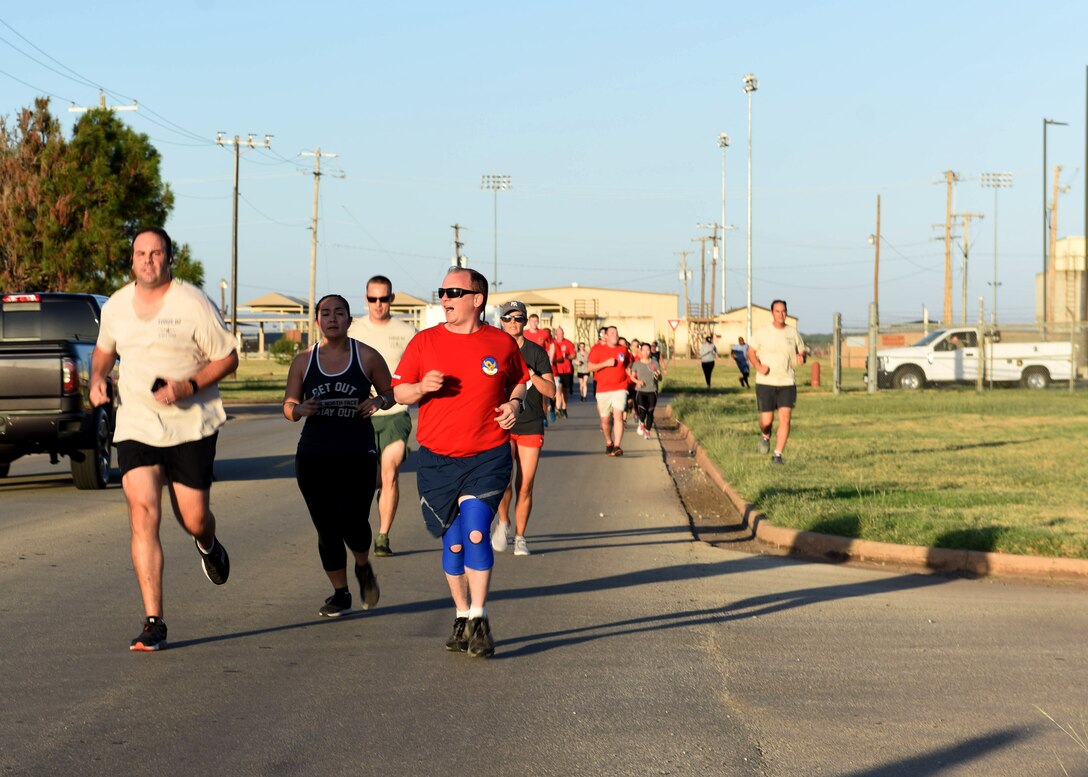 Airmen assigned to Dyess Air Force Base, Texas, participate in the TORQE 62 Memorial Run Oct. 2, 2019.