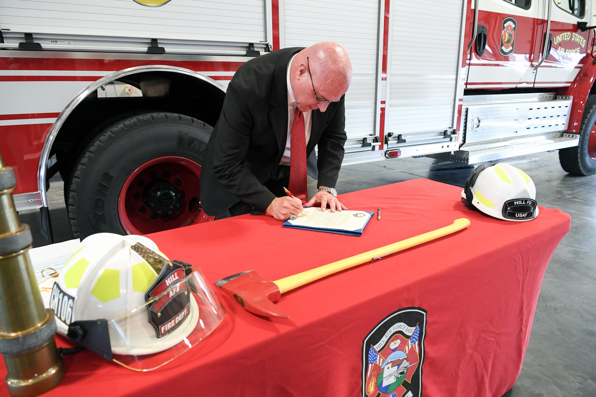 Harry Briesmaster, director for the 75th Civil Engineer Group, signs a proclamation Oct. 3, 2019, designating Oct. 6-12 Fire Prevention Week at Hill Air Force Base, Utah.