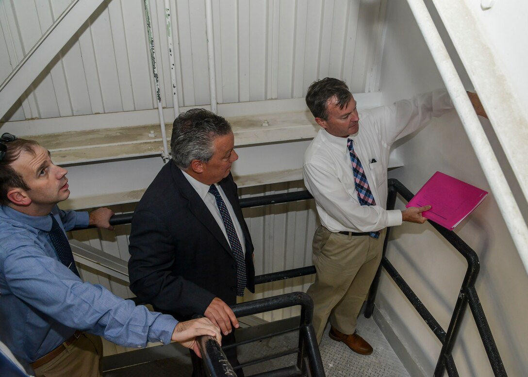 Thomas Fischer, Air Force Life Cycle Management Center Director of Engineering and Technical Management, headquartered at Wright-Patterson Air Force Base, Ohio, views the internal structure of the air traffic control tower at Plant 42, in Palmdale, California, Oct. 3. Fischer visited base facilities and received an up-close look at the Plant 42 air traffic control tower that was damaged as a result of the 2019 Ridgecrest earthquakes on July 4 and 5. (U.S. Air Force photo by Giancarlo Casem)