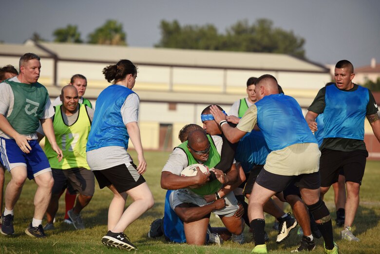 U.S. Airmen play a rugby game Sept. 14, 2019, at Incirlik Air Base, Turkey. Maj. Michael Stacpoole, 39th Medical Group healthcare integrator, and Tech. Sgt. Trebor Lewis, 39th Maintenance Squadron fabrications section chief, recently formed a rugby league at Incirlik with the help of volunteers who have played and studied the sport in the past. (U.S. Air Force Photo by Staff Sgt. Joshua Magbanua)