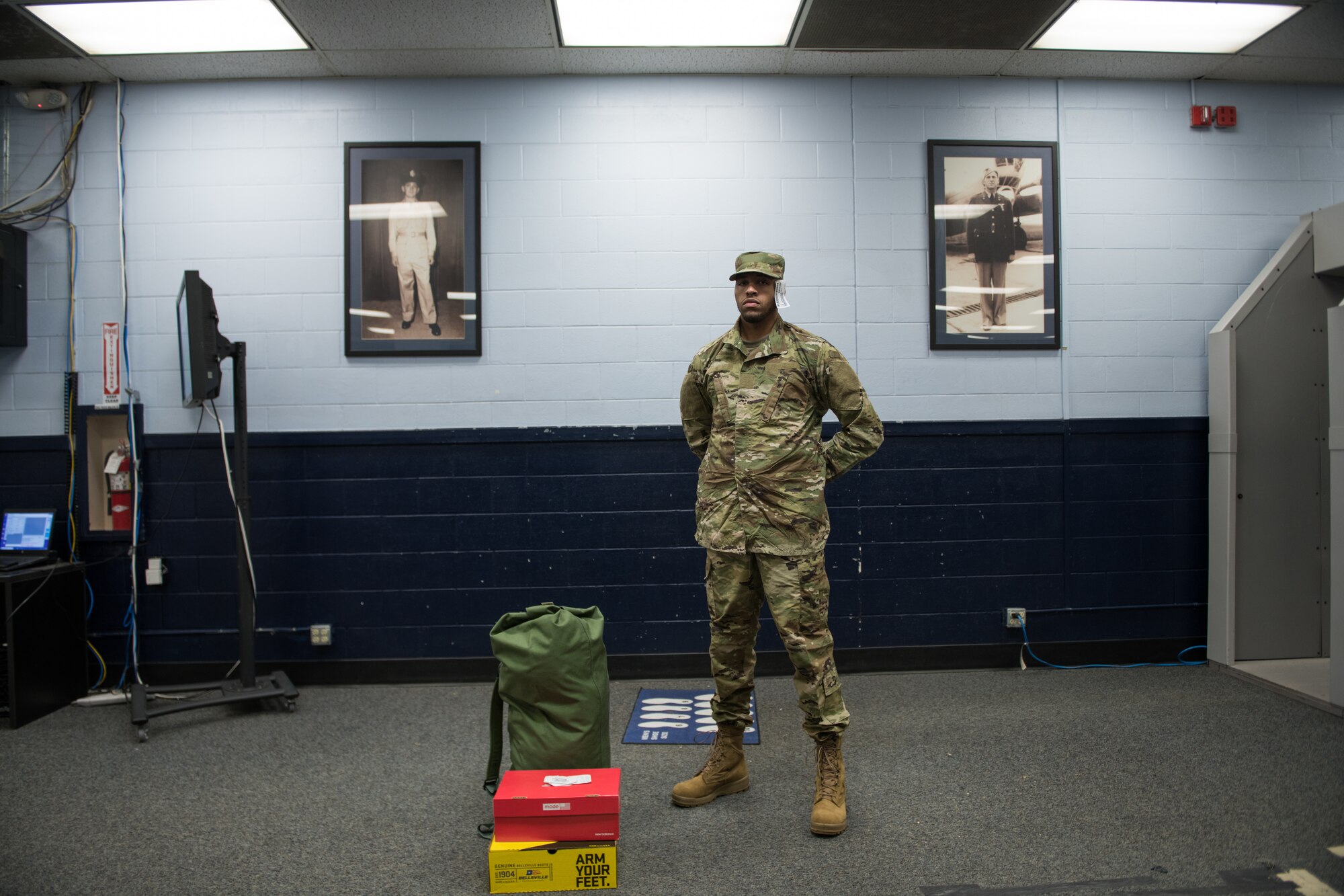 U.S. Air Force basic military training trainee Michael Byers, 326th Training Squadron, male flight, receives the first operational camouflage pattern (OCP) uniforms during initial issue, Oct. 2, 2019, at Joint Base San Antonio-Lackland, Texas.