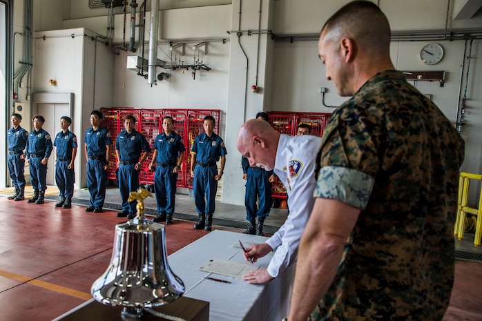 Colonel Fredrick Lewis signs Fire Prevention Proclamation