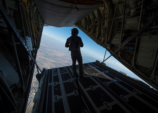 A group of Bulgarian paratroopers descend into Cheshnegirovo drop zone after performing a static-line jump in Plovdiv, Bulgaria, Oct. 2, 2019. During Thracian Fall, the 37th Airlift Squadron provided primary airlift support to a U.S.-sponsored military free-fall course for Bulgaria’s 68th Special Forces Brigade, resulting in a total of 121 personnel drops. (U.S. Air Force photo by Staff Sgt. Kirsten Brandes)