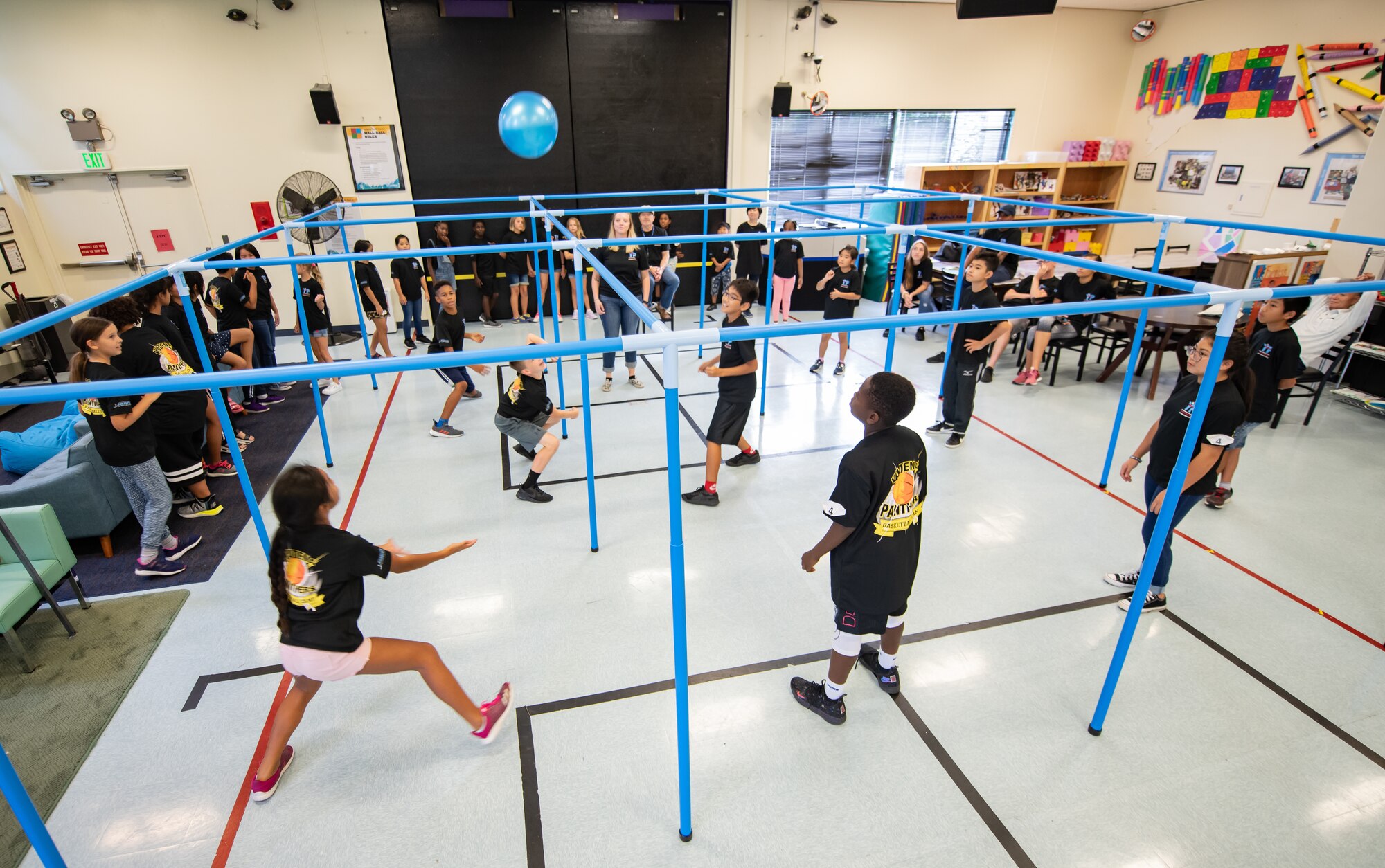 Children from Okinawa and the Kadena Youth Center play nine square in the air during Cultural Exchange Day Sept. 28, 2019, at Kadena Air Base, Japan. The children were divided into six teams to play a variety of games, learn about each other’s culture and develop friendships. (U.S. Air Force photo by Staff Sgt. Micaiah Anthony)