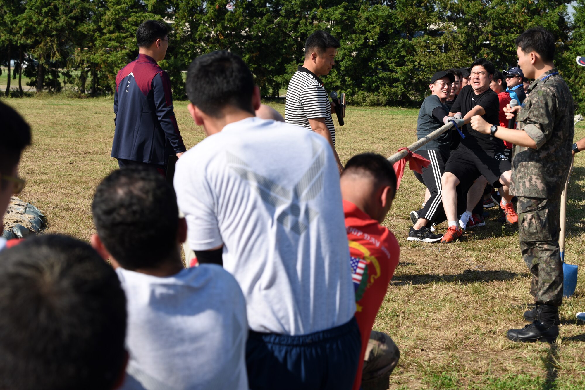 U.S. Air Force 8th Fighter Wing and Republic of Korea 38th Fighter Group compete in tug-of-war during Friendship Day at Kunsan Air Base, Republic of Korea, Oct. 4, 2019. Throughout the day Airmen from the U.S. and ROK competed in nine different events with the 8th Mission Support Group winning overall. (U.S. Air Force photo by Staff Sgt. Joshua Edwards)