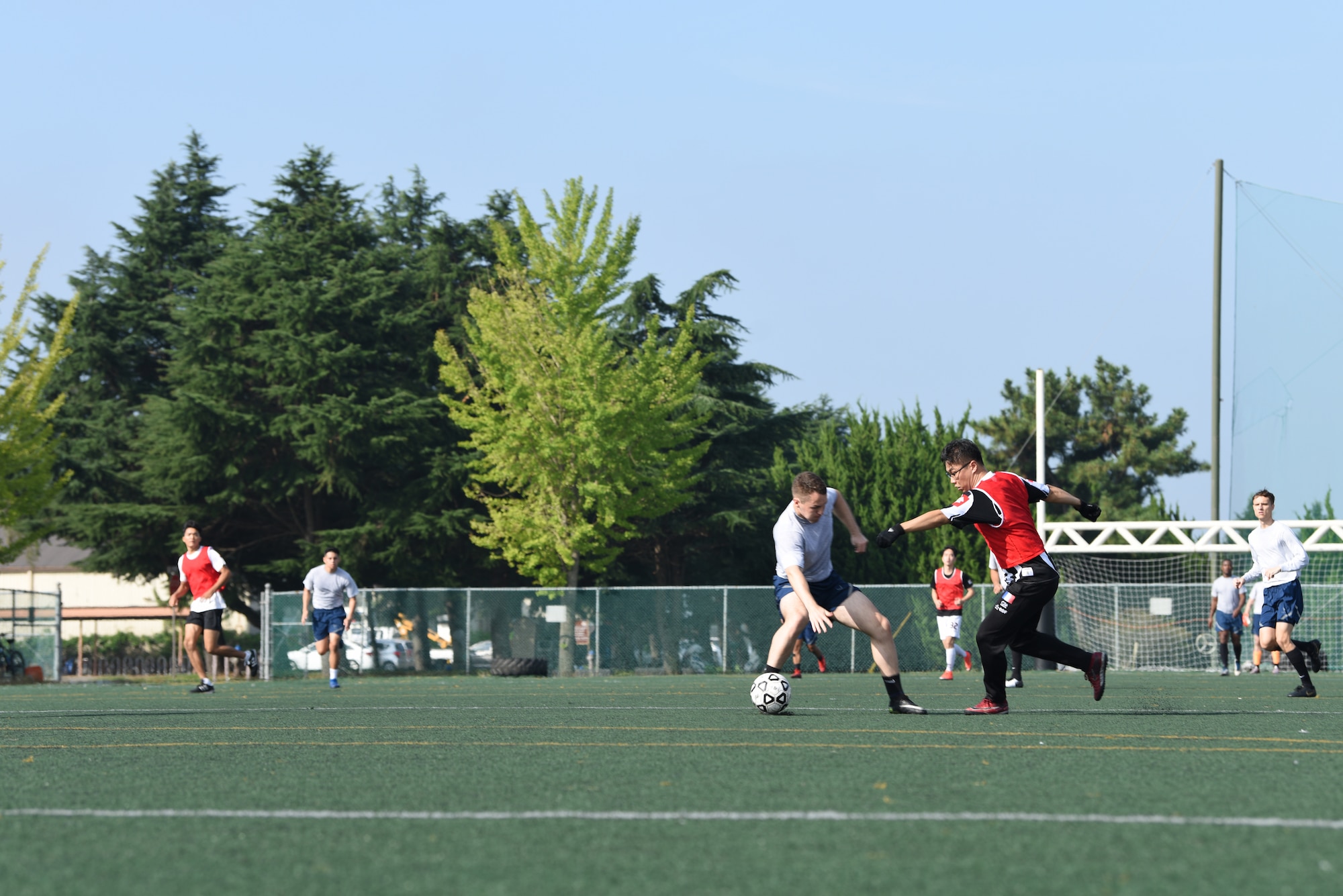 U.S. Air Force 8th Fighter Wing and Republic of Korea Air Force 38th Fighter Group members play soccer together during Friendship Day at Kunsan Air Base, Republic of Korea, Oct. 4, 2019. Friendship Day celebrates the partnership and alliance between the 8th FW and 38th FG, who participated in several sporting events and competitions throughout the day. (U.S. Air Force photo by Staff Sgt. Joshua Edwards)