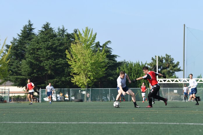 U.S. Air Force 8th Fighter Wing and Republic of Korea Air Force 38th Fighter Group members play soccer together during Friendship Day at Kunsan Air Base, Republic of Korea, Oct. 4, 2019. Friendship Day celebrates the partnership and alliance between the 8th FW and 38th FG, who participated in several sporting events and competitions throughout the day. (U.S. Air Force photo by Staff Sgt. Joshua Edwards)