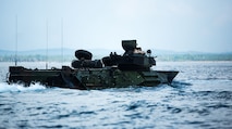 U.S. Marines with 3rd Marine Division conduct ship-to-shore movements in Assault Amphibious Vehicles (AAV) before the start of exercise Tiger Strike 19 in the Celebes Sea, Malaysia, on Sept. 30, 2019. Utilizing AAVs, Marines disembarked the USS Green Bay (LPD-20), landed on Blue Beach, Malaysia, then brought back members of the Malaysian Armed Forces (MAF) aboard the vessel to participate in the opening ceremony for exercise Tiger Strike 19 and a tour. Tiger Strike 19 focuses on strengthening joint military interoperability and on increasing readiness by practicing for humanitarian assistance, disaster relief, amphibious and jungle warfare operations, all while fostering cultural exchanges between the MAF and the U.S. Navy, Marine Corps team. (U.S. Marine Corps photo by Cpl. Josue Marquez)