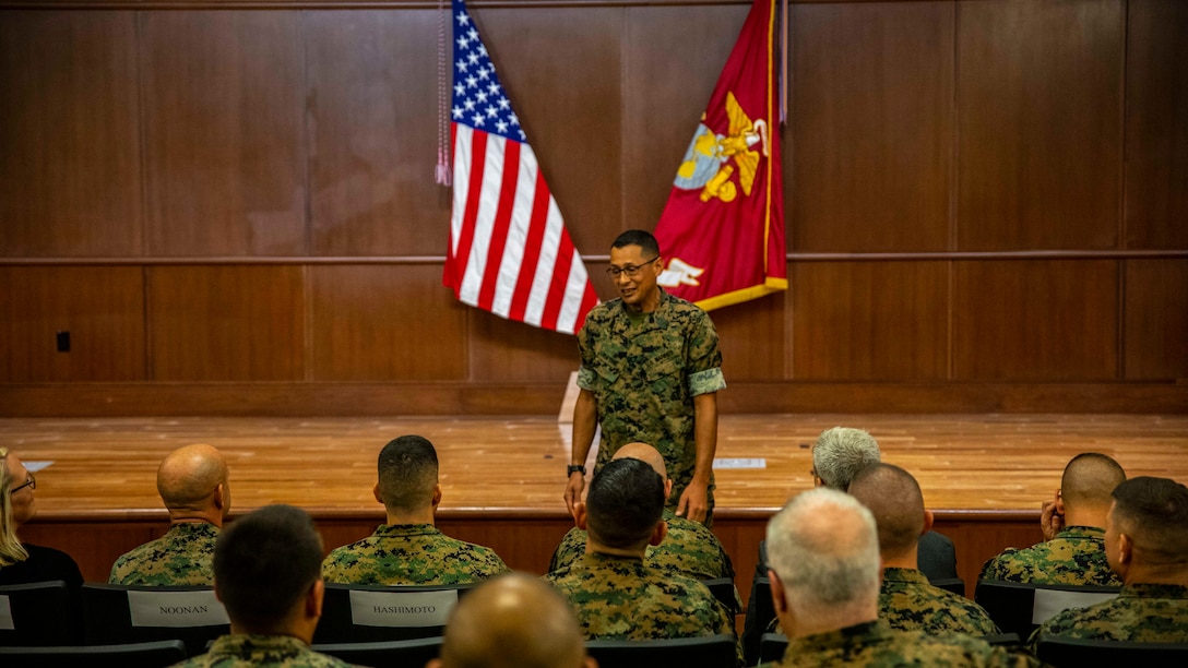 U.S. Marine Corps Sgt. Maj. Michael S. Payne, center, the incoming sergeant major of Force Headquarters Group, speaks to the audience during a relief and appointment ceremony at Marine Corps Support Facility New Orleans, Oct. 3, 2019. Sgt. Maj. Darby J. Noonan, the outgoing sergeant major of Force Headquarters Group, relinquished his duties as FHG sergeant major to Payne. Payne came to Marine Forces Reserve from his previous command of Staff Noncommissioned Officer Academy in Okinawa, Japan, where he served as the director. (U.S. Marine Corps photo by Sgt. Andy O. Martinez)