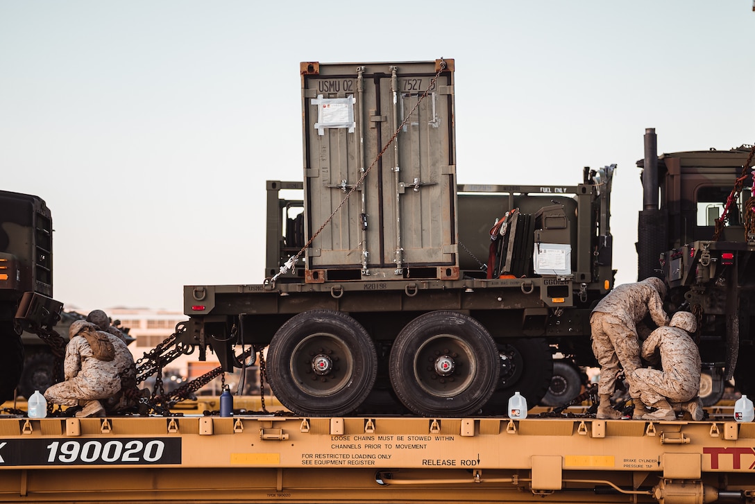 U.S. Marines with 2nd Marine Division unload tactical vehicles from a locomotive at Marine Corps Logistics Base, Barstow, Oct. 1, 2019. The vehicles will be used in the upcoming Integrated Training Exercise taking place at Marine Corps Air Ground Combat Center Twentynine Palms.