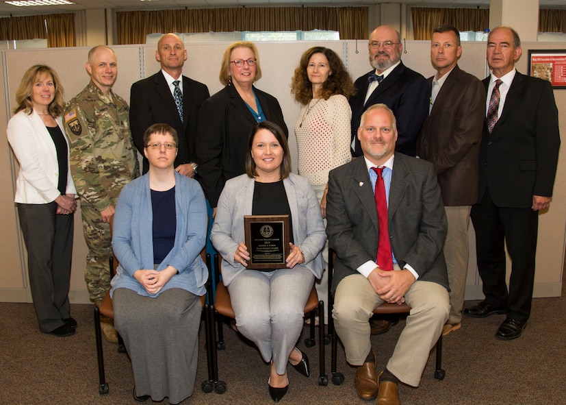 Employees from the U.S. Army Materiel Command Legal Center-Rock Island Arsenal received the AMC Team Project Award at the AMC Legal Conference held recently at Redstone Arsenal, Huntsville, Alabama.
