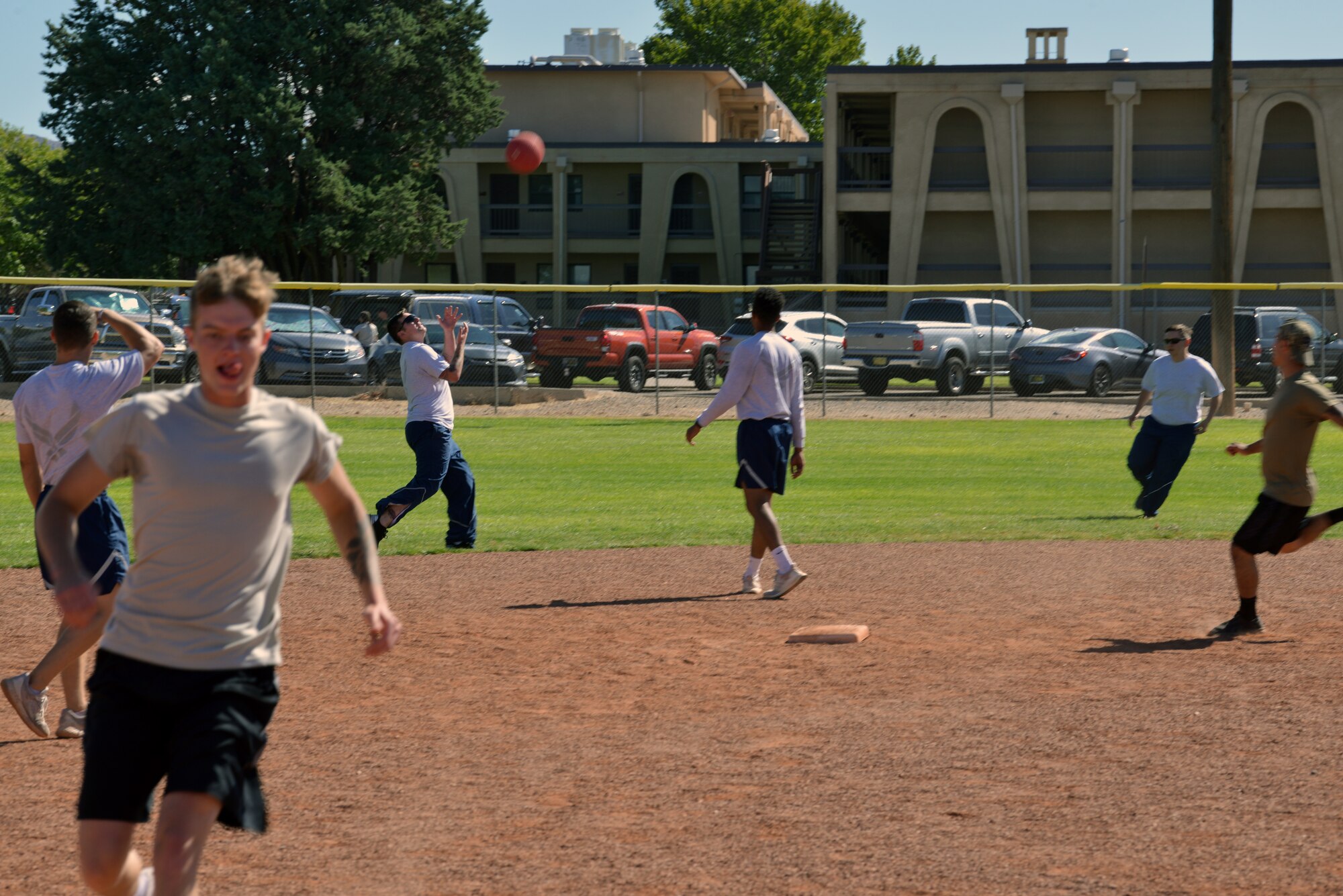 Members of the 58th Special Operations Wing play kickball during the 2019 58 SOW Sports Day at Kirtland Air Force Base, N.M., Sept. 27, 2019. Other sports played throughout the day included basketball, kickball, volleyball and more. The sports day included a competition between all the squadrons in the wing with top placements in every sport earning points for the unit. The 58th Aircraft Maintenance Squadron won the competition with almost double the points of the second place squadron.