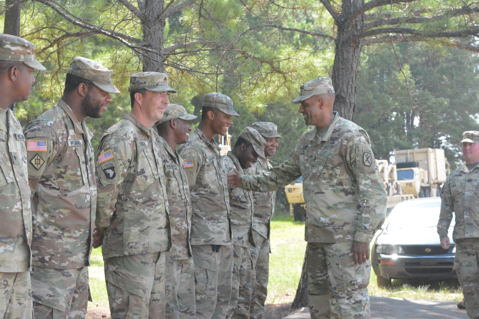 Maj. Gen. Gary M. Brito, center right, Maneuver Center of Excellence and Fort Benning commanding general, talks with Soldiers of the 877th Engineer Company, 878th Engineer Battalion, Georgia Army National Guard, Sept. 13. U.S. Army Garrison Fort Benning and the Georgia Army National Guard worked for two weeks to demolish dilapidated buildings, providing the National Guard Soldiers mission-essential training.
