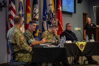 Chemical Biological Incident Response Force (CBIRF) Commander U.S. Marine Corps Col. Donald Riley speaks as part of a leadership panel during a Defense Chemical, Biological, Radiological and Nuclear (CBRN) Response Force (DRCF) leadership symposium. The symposium was held during Joint Task Force Civil Support’s (JTF-CS) 20th anniversary celebration, which also included a room dedication for the late U.S. Army Maj. Gen. (ret) Jeff Mathis III, who served as the command’s commanding general from July 2012 to July 2014. The celebration was attended by representatives from U.S. Northern Command (NORTHCOM) and U.S. Army North (ARNORTH), DCRF unit commanders and Federal Emergency Management Agency (FEMA) regional leaders, as well as prior JTF-CS members and alumni. (Official DoD photo by Mass Communication Specialist 3rd Class Michael Redd/RELEASED)