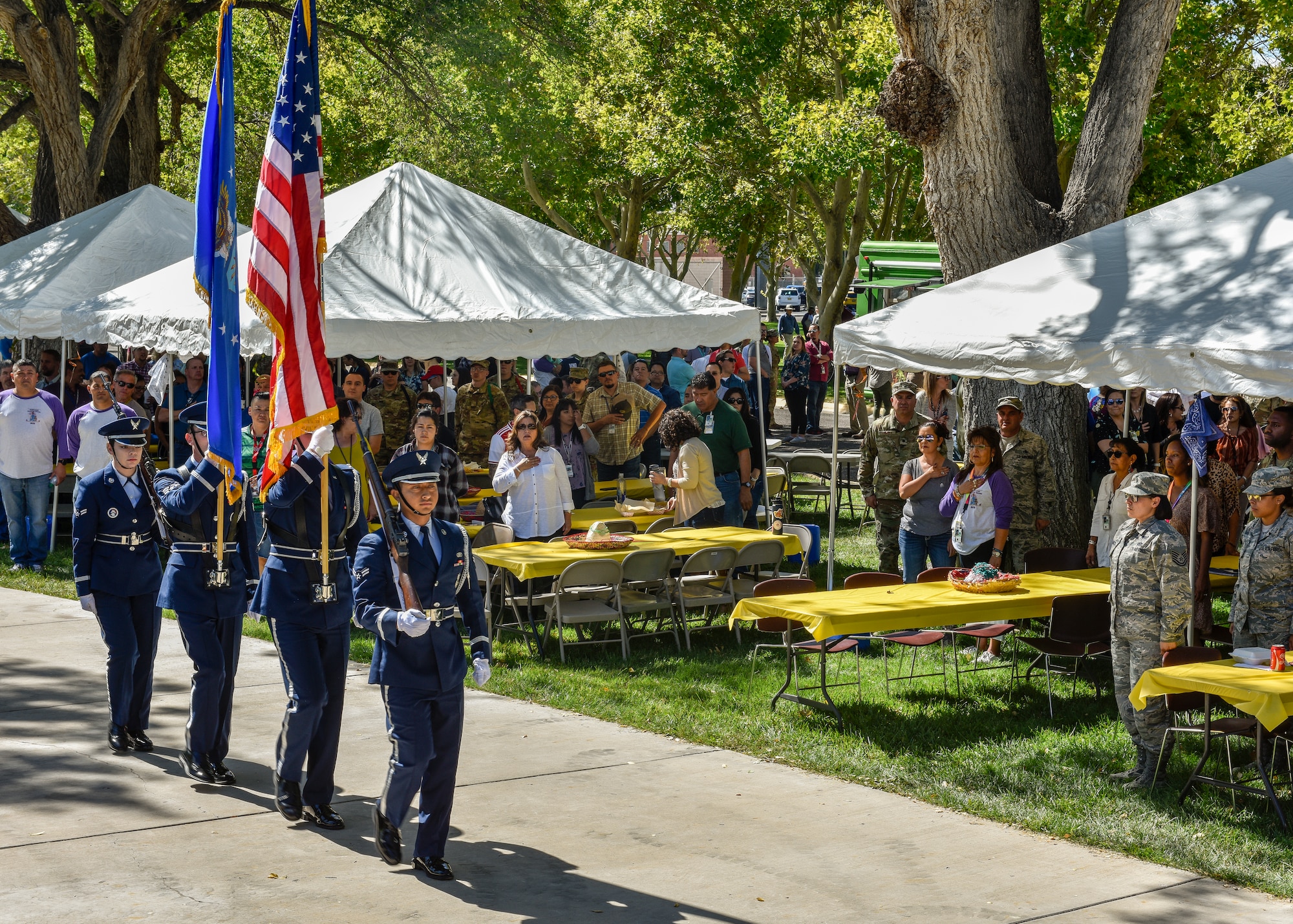 Members of the Kirtland Air Force Base Honor Guard present the colors at the Hispanic Heritage Month festival at Kirtland Air Force Base, N.M., Oct. 3, 2019. The festival featured live music, folkloric dance, food trucks, information booths, key note speakers and a car show. (U.S. Air Force photo by Airman 1st Class Austin J. Prisbrey)