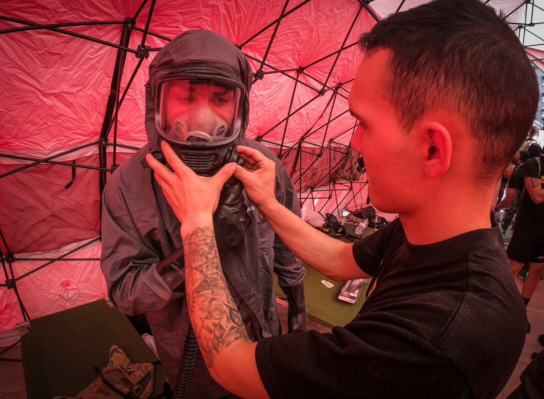An Army Reserve Soldier from the 413th Chemical Company, 457th Chemical Battalion, 415th Chemical Brigade, 76th Operational Response Command checks the chemical protective mask of a fellow Soldier before he begins conducting a mass casualty decontamination training event at the Jacobi Medical Center, Bronx, New York, September 28. The event, which involved nearly 150 Army Reserve Soldiers, was part of a two-day consequence management training exercise focused on mass casualty decontamination, Chemical, Biological, Radiological and Nuclear (CBRN) reconnaissance and medical operations along side multiple civilian agencies in and around New York City. The training involved various scenarios including rescuing patients from a Subway disaster and decontamination operations at a local hospital. (Official U.S. Army Reserve photo by Sgt. 1st Class Brent C. Powell)