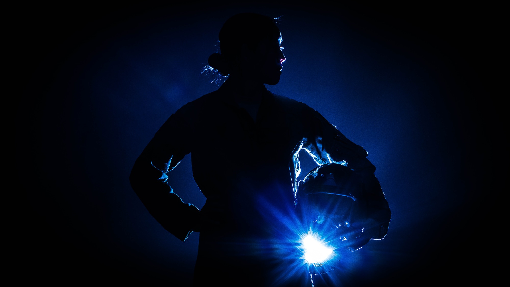 Capt. Lauren Kram, a B-2 Spirit pilot, stands for a photo at Whiteman Air Force Base, Missouri, Sept. 30, 2019. Kram was the 10th female pilot to graduate from the B-2 pilot training program. (U.S. Air Force photo illustration by Senior Airman Ashley Adkins)