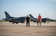 Two tactical aircraft maintainers assigned to the 157th Fighter Squadron (FS), walk along the flightline during Combat Archer 19-12 at Tyndall Air Force Base, Fla., Sept. 24, 2019. The F-16 Fight Falcon fighter jets from the 157th FS’s integration acted as alert aircraft and simulated an alert scramble replicating a homeland defense mission.  (U.S. Air Force photo by Airman 1st Class Bailee A. Darbasie)