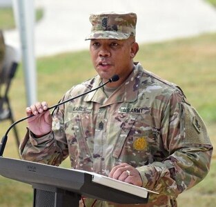 Command Sgt. Maj. Napoleon Noguerapayan speaks at the MEDCoE change of responsibility ceremony.